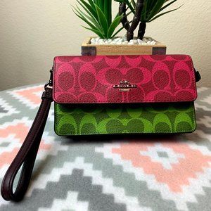 FOLDOVER WRISTLET IN BLOCKED SIGNATURE CANVAS